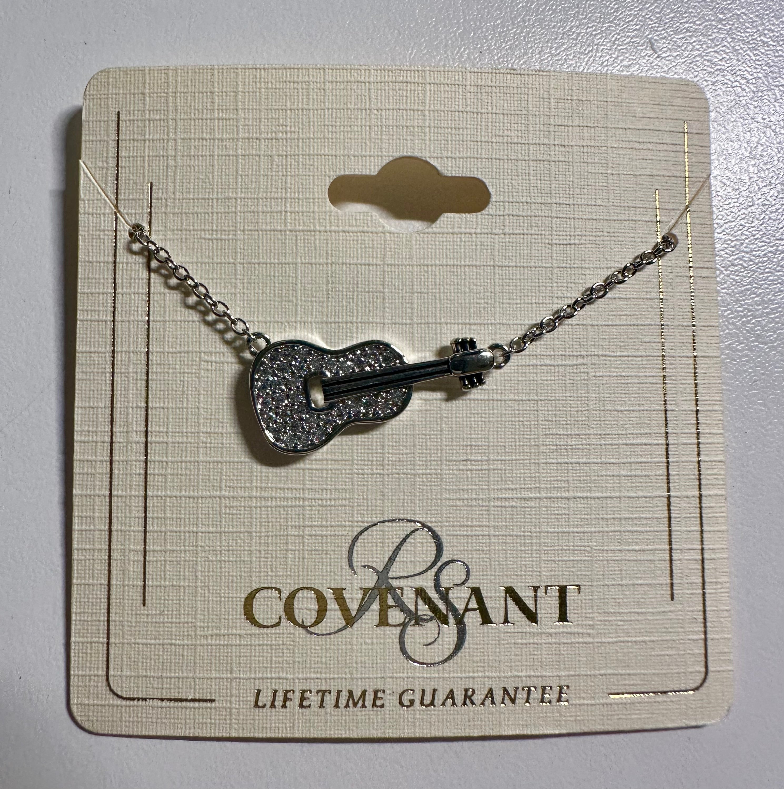 Necklace: Guitar with stones on it