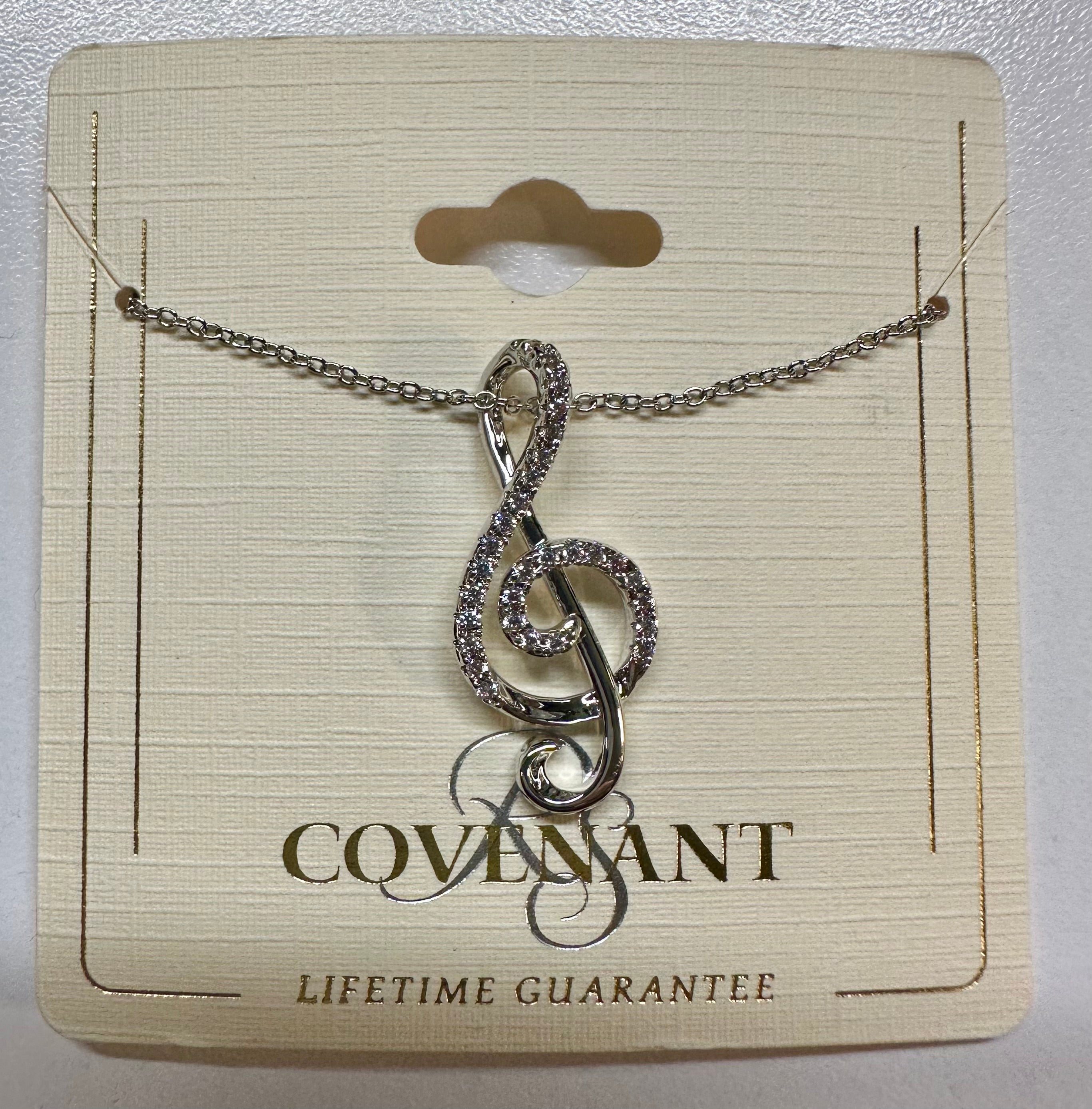 Necklace: Treble Clef with stones on it